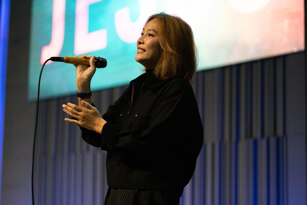person speaking confidently on stage